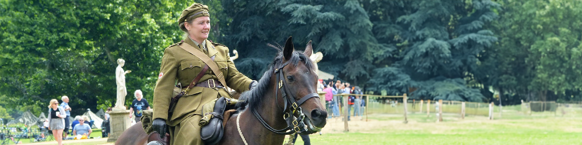 A WWI visitor during a WWI event on a horse