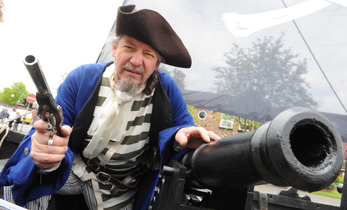 A picture of a Marvellous History visitor dressed as a pirate with a cannon