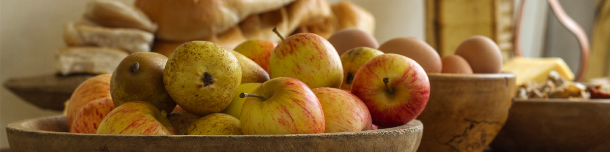 A viking display with various foods such as apples